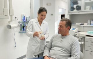 dental implants recovery consultation Woodbridge VA patient dentist discussion